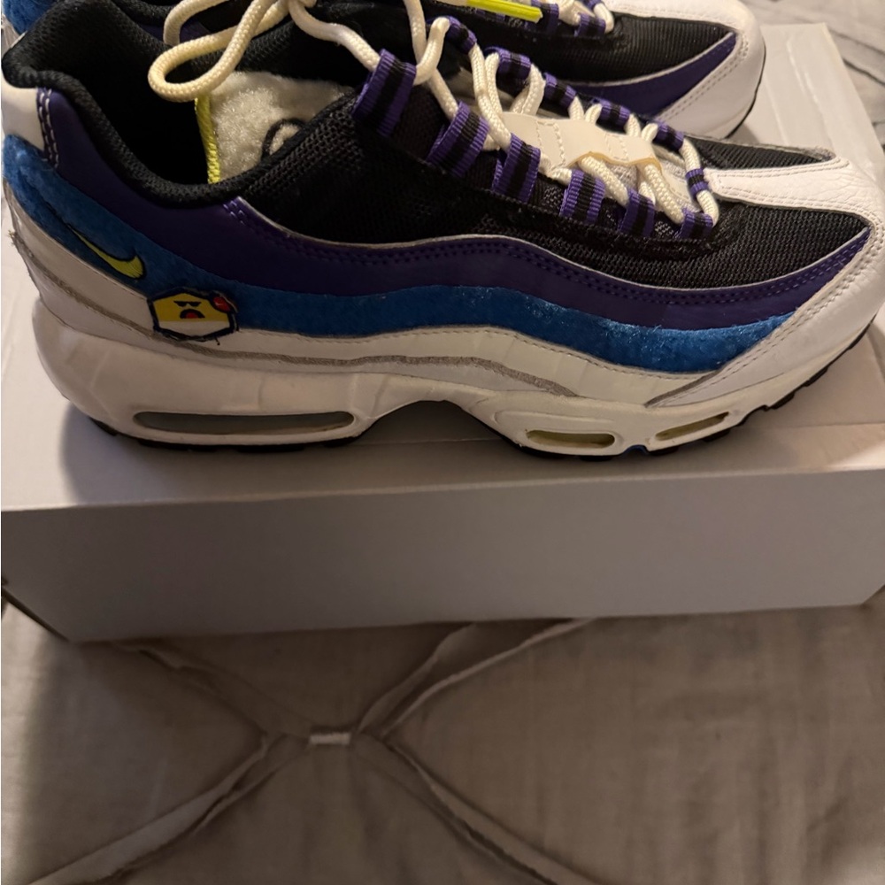 Nike sneakers in purple, blue, black and white